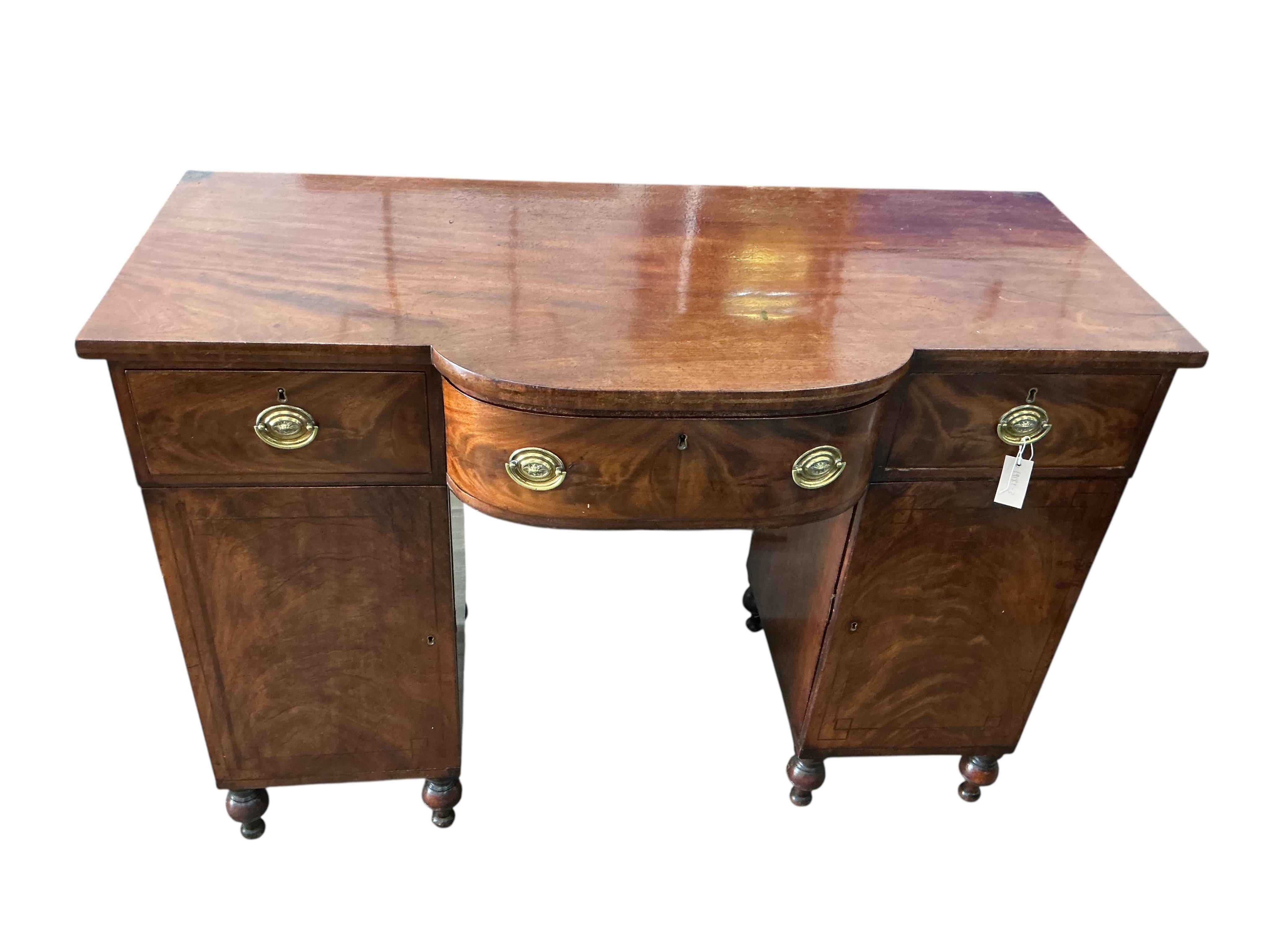 A George III mahogany bow front sideboard, width 134cm, depth 63cm, height 94cm